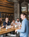 Smiling visitors during a guided tasting at the CIRKA tasting room